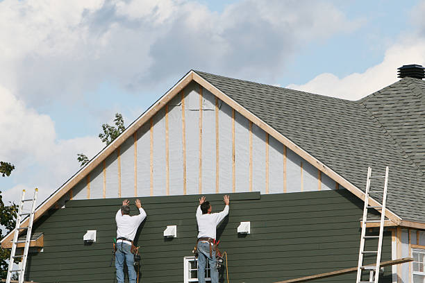Professional Siding Replacement technician working in Kittredge, CO